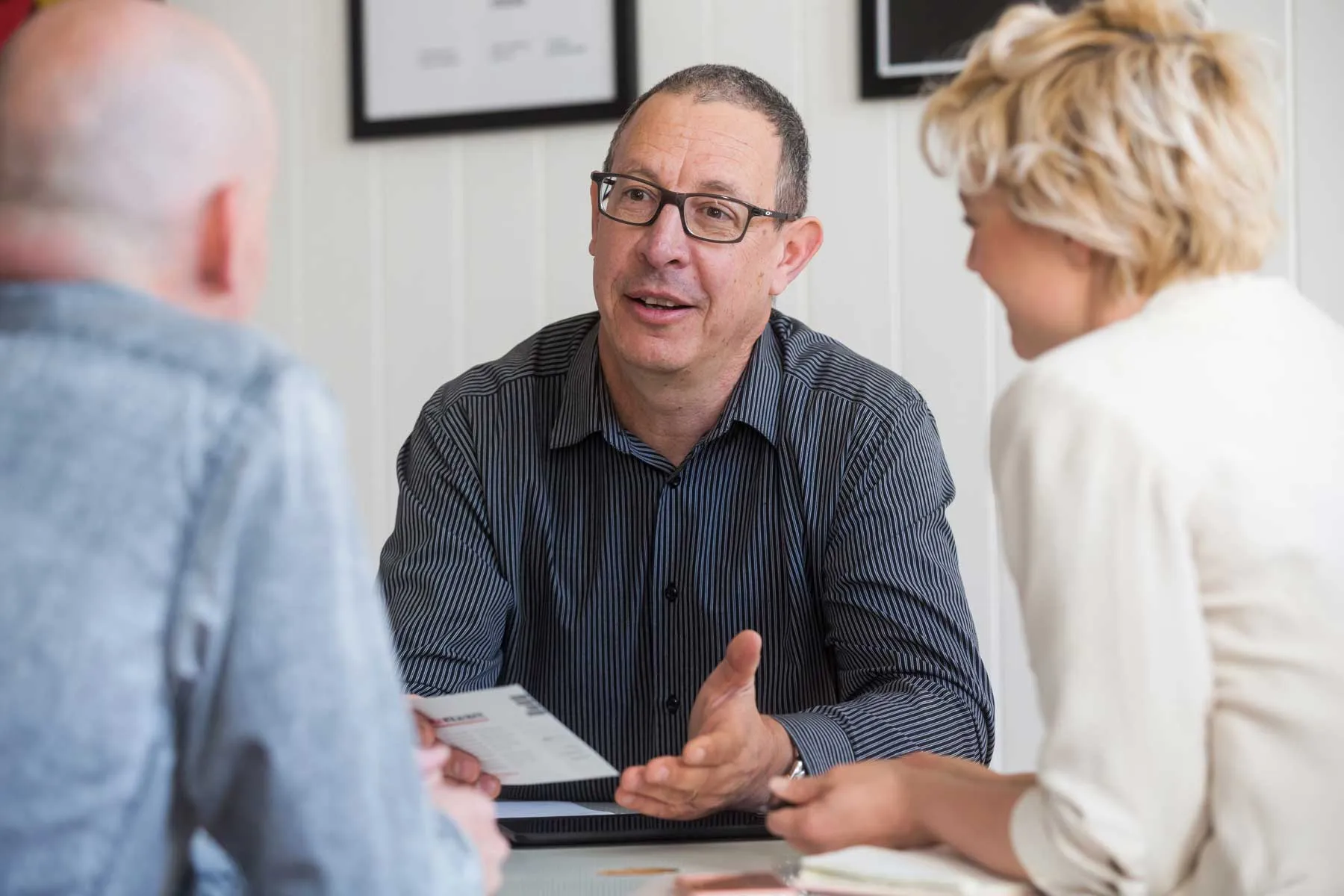 Gary Richards in meeting with clients